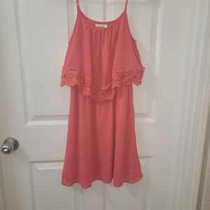 peach colored tiered dress with lace